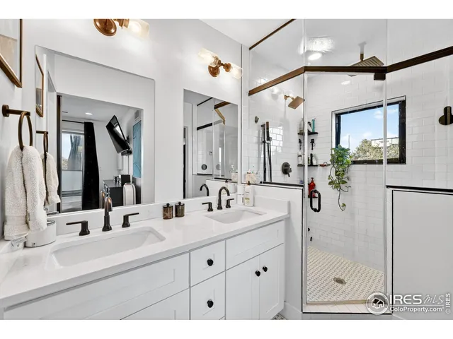 a bathroom with a sink and mirror
