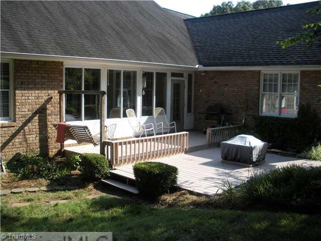 801 Shamrock Road High Point, NC 27265 - Photo 3 of 12 Patio/Deck. Great deck area off the enclosed patio area. Enjoy great evenings with swing, built-in fire pit and fish pond