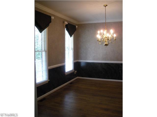 801 Shamrock Road High Point, NC 27265 - Photo 6 of 12 Dining Room. With chair rail, crown molding & hardwood floors