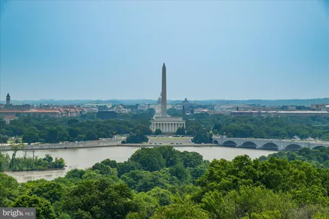 a view of a lake with a city view