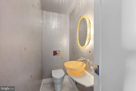 a view of a balcony with chair and table