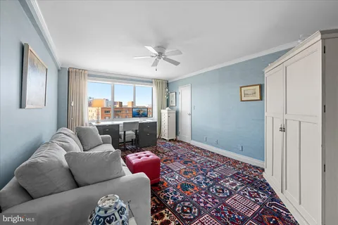 a view of a swimming pool with a chair