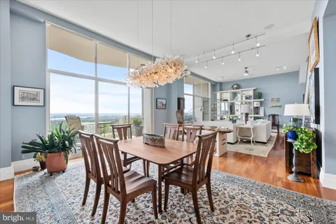 a kitchen that has a lot of cabinets in it