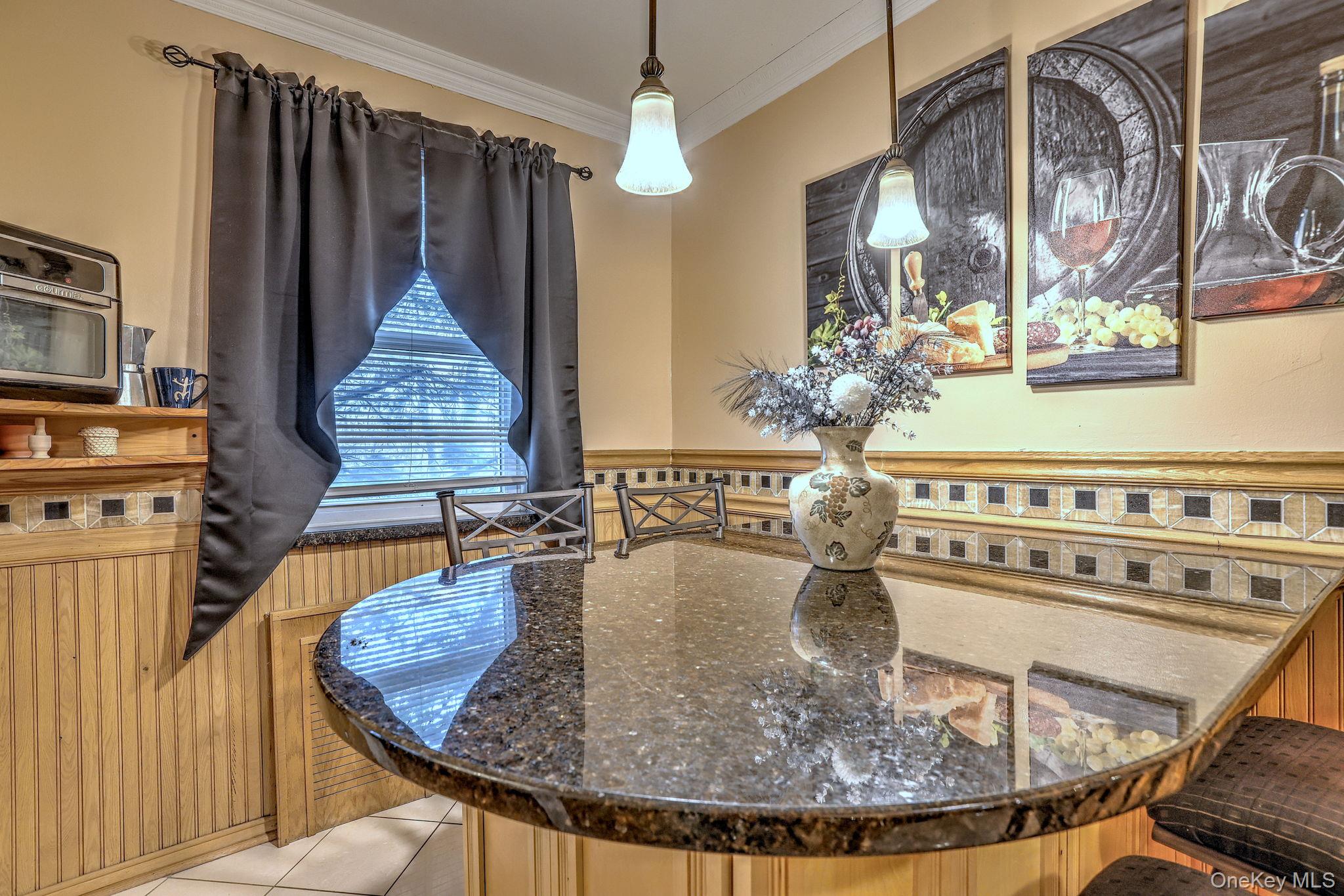 450 Pelham Road, Unit 3B New Rochelle, NY 10805 - Photo 7 of 19 a view of a dining room with furniture window and wooden floor