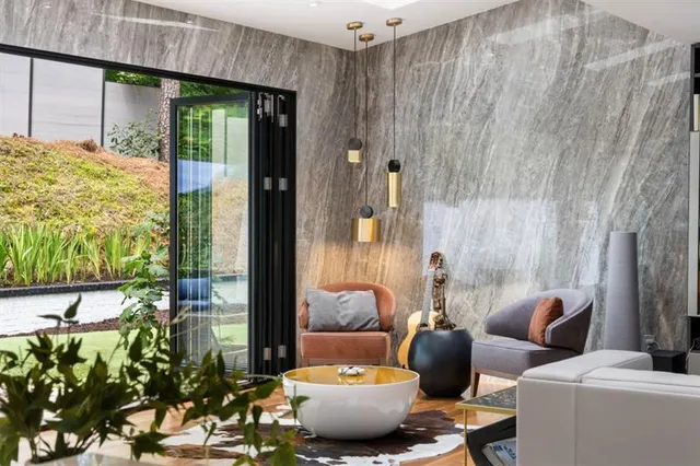 a living room with furniture and a window