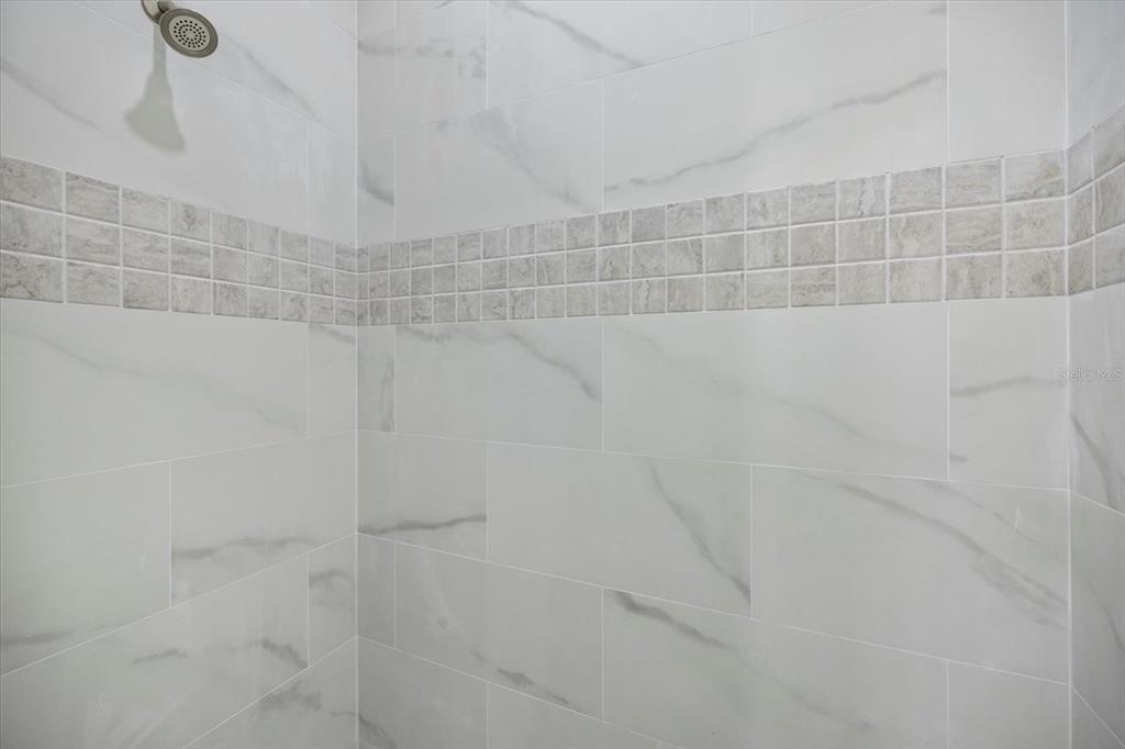 3525 McIntosh Road Sarasota, FL 34232 - Photo 21 of 40 a bathroom with a shower