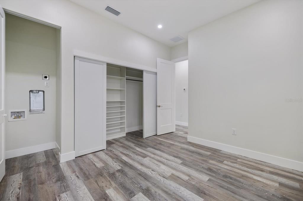 3525 McIntosh Road Sarasota, FL 34232 - Photo 23 of 40 wooden floor in an empty room