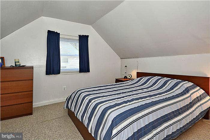 711 Justin Way Silver Spring, MD 20901 - Photo 19 of 22 a bedroom with bed and window