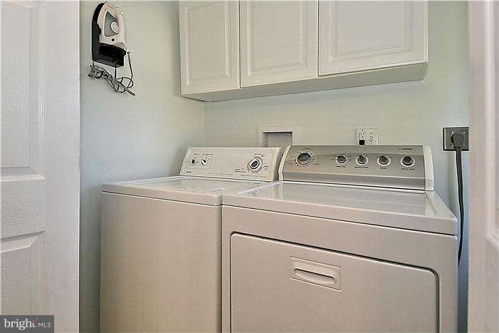 711 Justin Way Silver Spring, MD 20901 - Photo 20 of 22 a close up view of washer and dryer