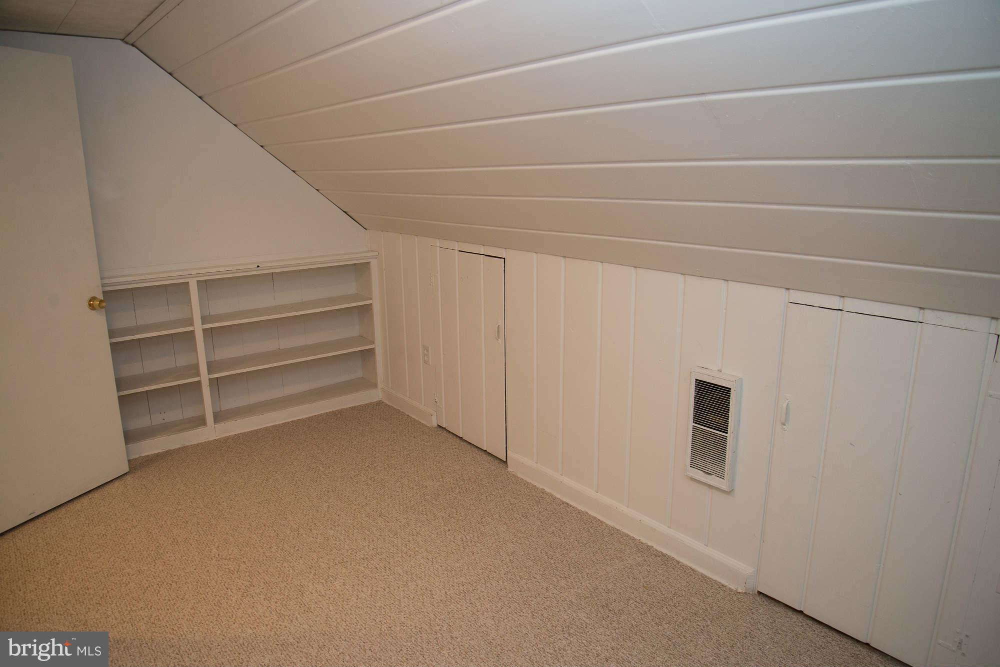 711 Justin Way Silver Spring, MD 20901 - Photo 21 of 22 a view of walk in closet with empty racks