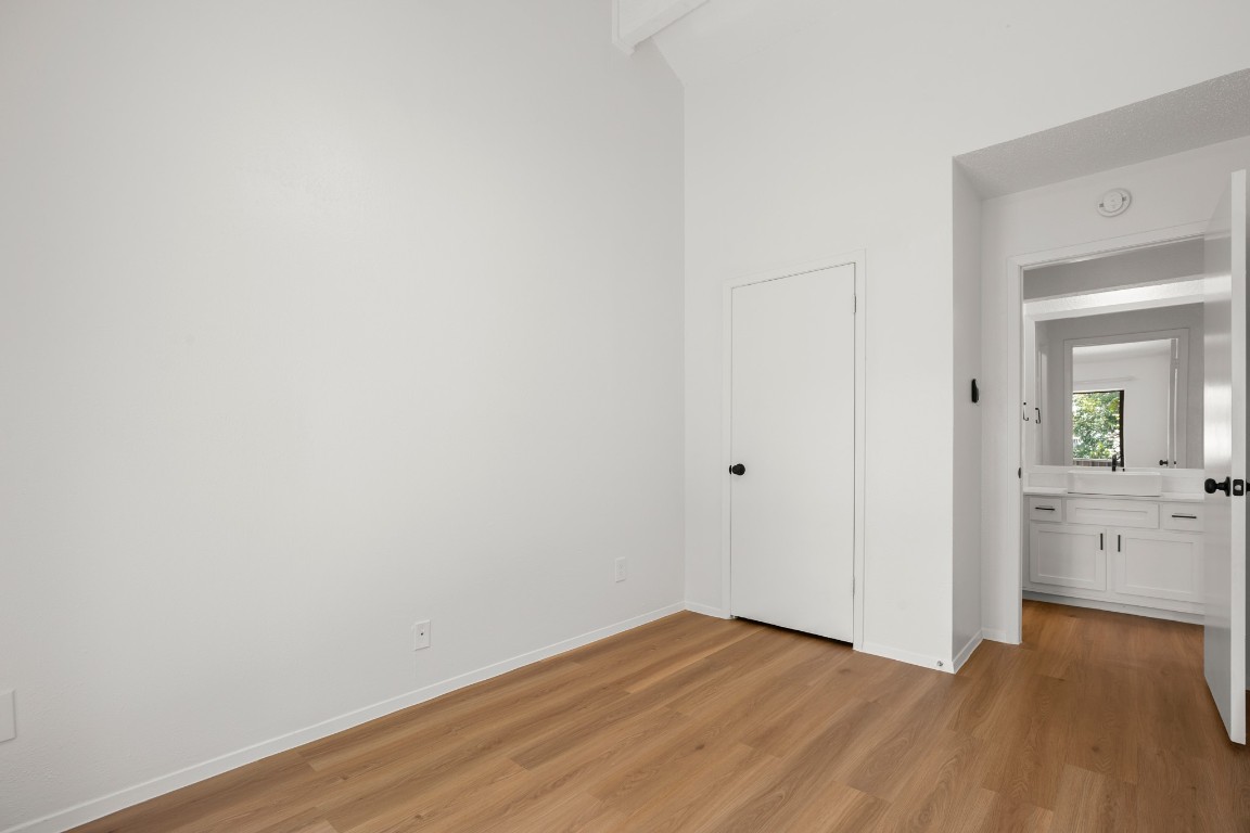 4205 Speedway, Unit 301 Austin, TX 78751 - Photo 12 of 19 a view of a room with wooden floor