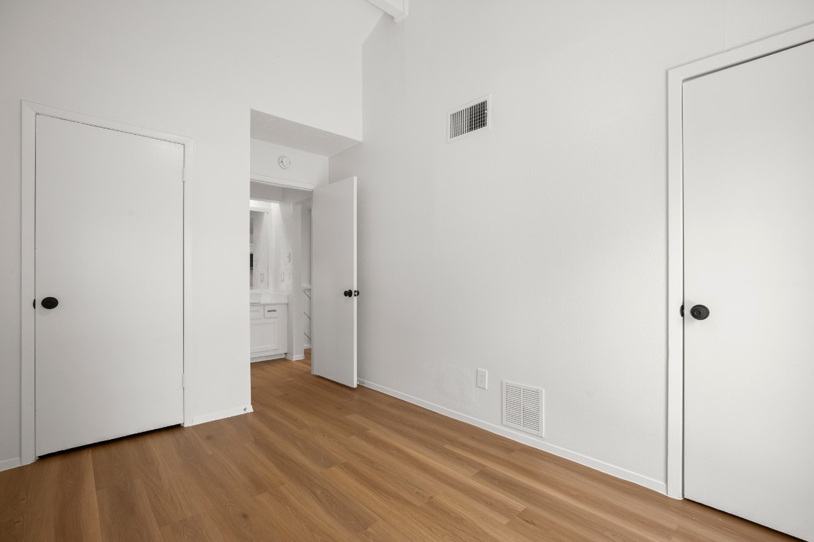 4205 Speedway, Unit 301 Austin, TX 78751 - Photo 13 of 19 a view of an empty room with wooden floor