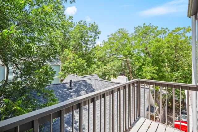 a view of a balcony with an outdoor space