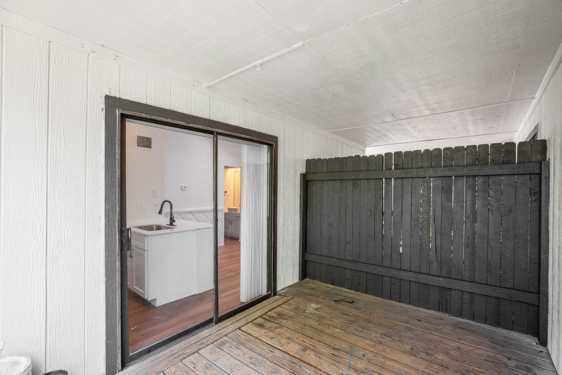 4205 Speedway, Unit 301 Austin, TX 78751 - Photo 18 of 19 a view of a hallway with wooden floor