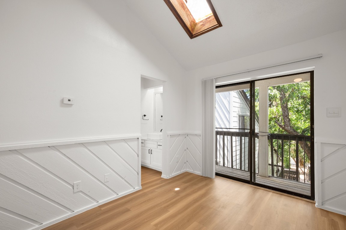 4205 Speedway, Unit 301 Austin, TX 78751 - Photo 4 of 19 a view of front door with wooden floor
