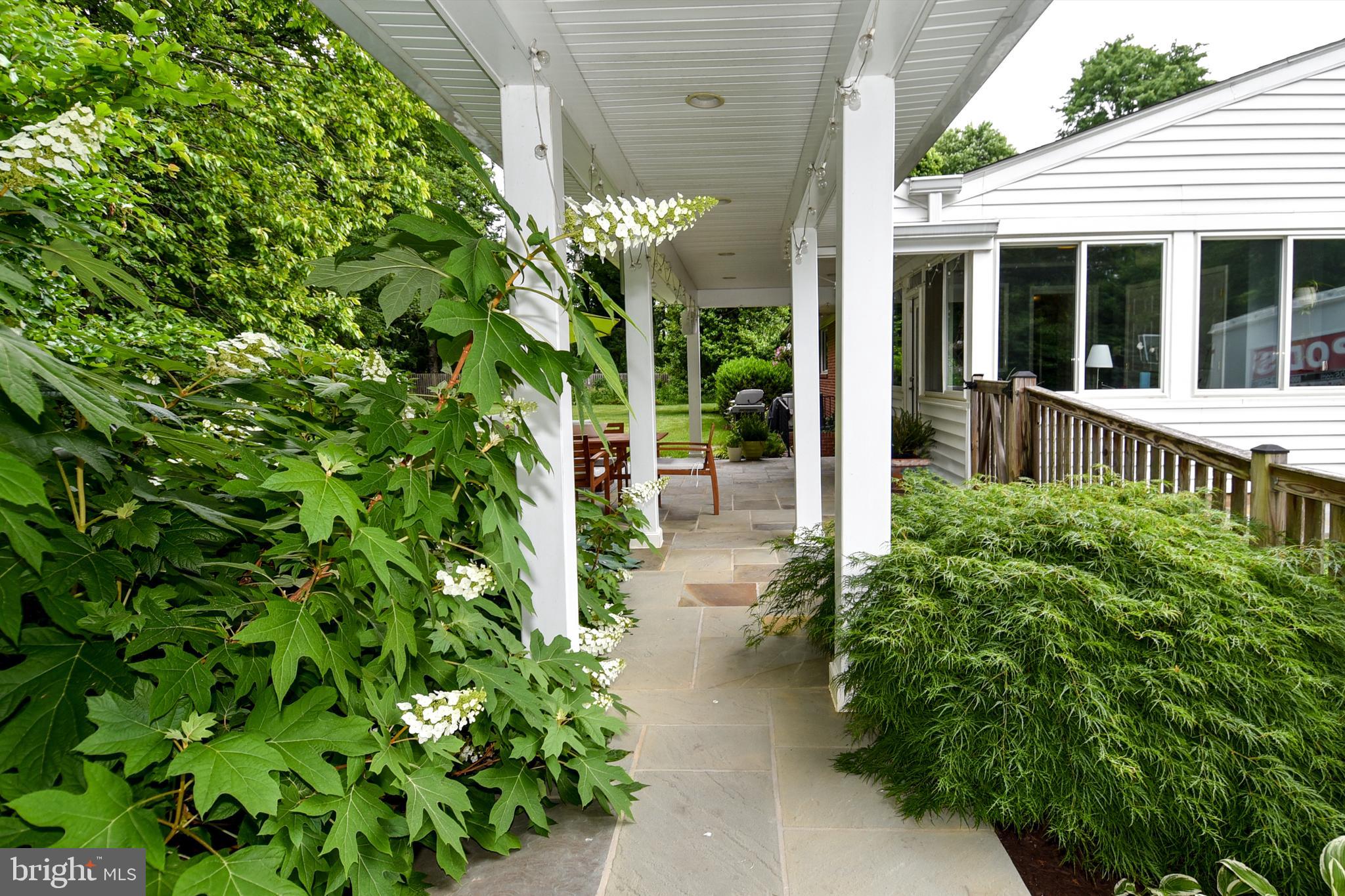 13712 Berkley Road Silver Spring, MD 20904 - Photo 38 of 48 Breezeway from Garage to rear covered patio