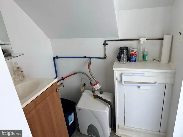 a bathroom with a toilet and a sink