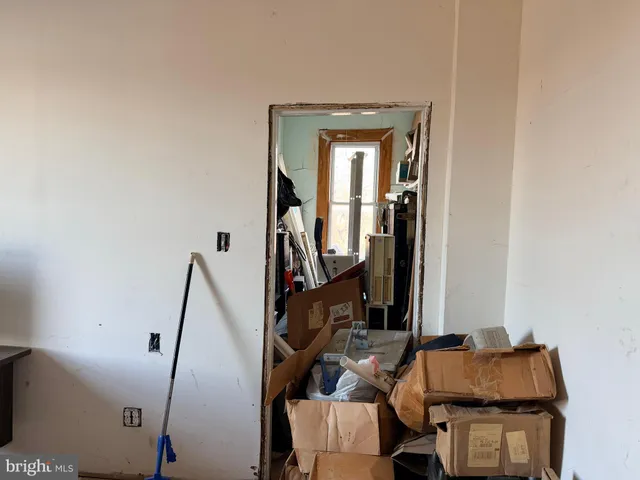 a view of workspace with wooden floor and windows