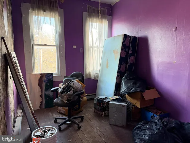 a view of a workspace with furniture