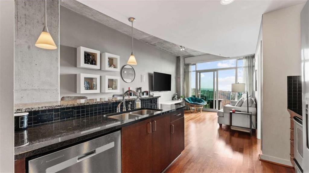 250 Pharr Road Northeast, Unit 712 Atlanta, GA 30305 - Photo 11 of 34 a view of a living room and dining room