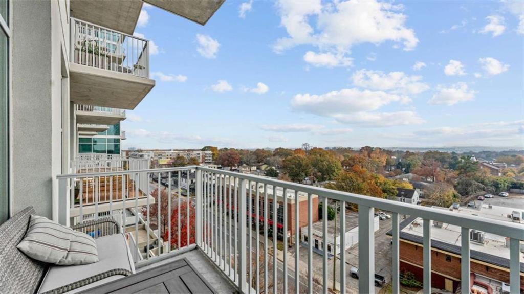 250 Pharr Road Northeast, Unit 712 Atlanta, GA 30305 - Photo 14 of 34 a view of a balcony with furniture