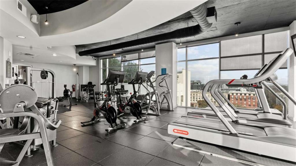 250 Pharr Road Northeast, Unit 712 Atlanta, GA 30305 - Photo 27 of 34 a view of a room with gym equipment