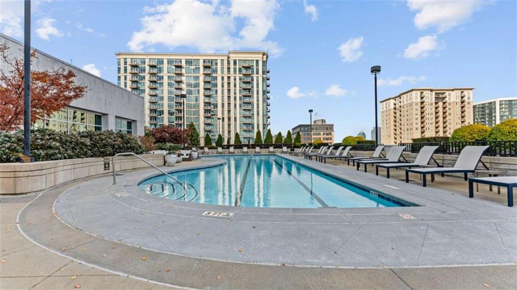 250 Pharr Road Northeast, Unit 712 Atlanta, GA 30305 - Photo 29 of 34 a view of pool with outdoor seating