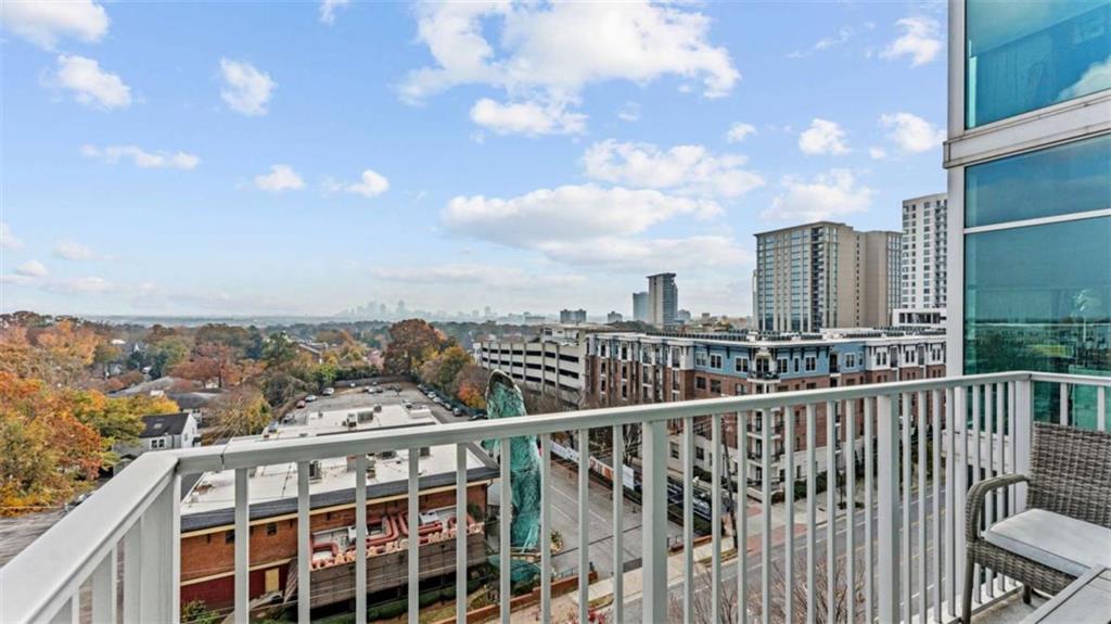 250 Pharr Road Northeast, Unit 712 Atlanta, GA 30305 - Photo 5 of 34 a view of a city skyline from a terrace