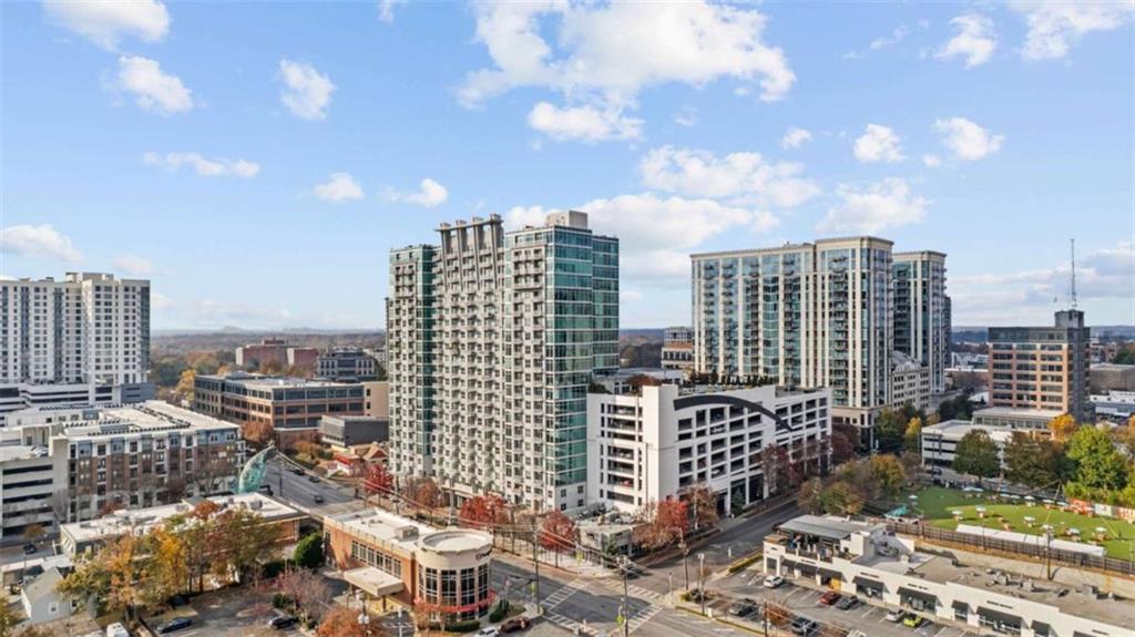 250 Pharr Road Northeast, Unit 712 Atlanta, GA 30305 - Photo 6 of 34 a city view with tall buildings