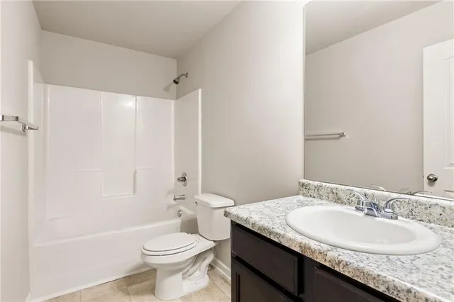 a view of a small space with a window and a bathroom