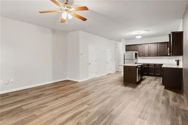 a view of kitchen with wooden floor