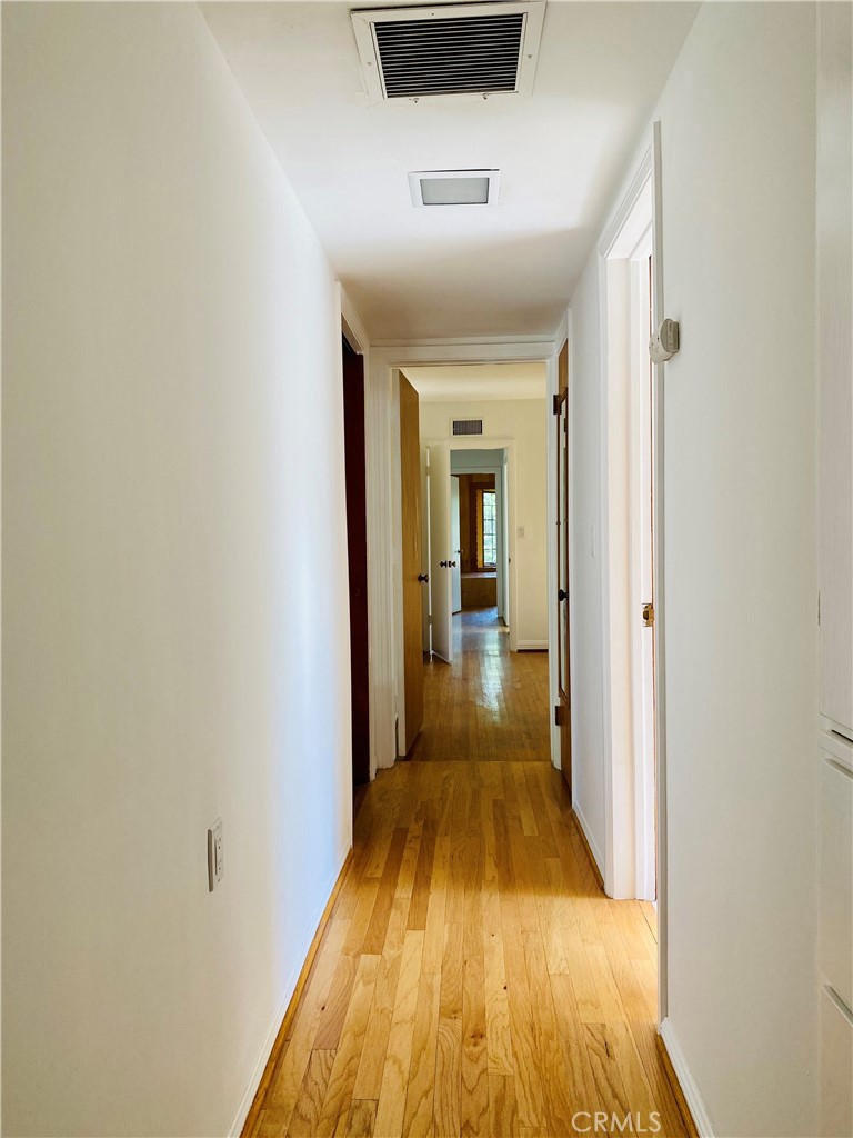 1917 Lyans Drive La Canada Flintridge, CA 91011 - Photo 14 of 25 a view of a hallway with wooden floor