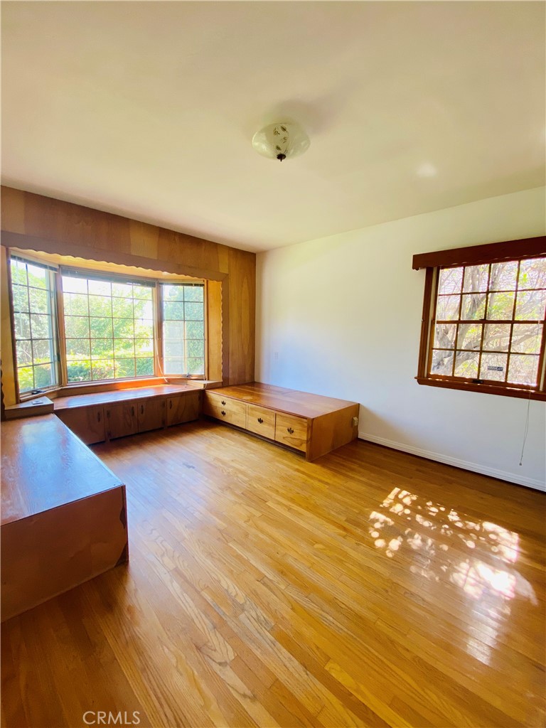 1917 Lyans Drive La Canada Flintridge, CA 91011 - Photo 25 of 25 a living room with hard wood floors and a window