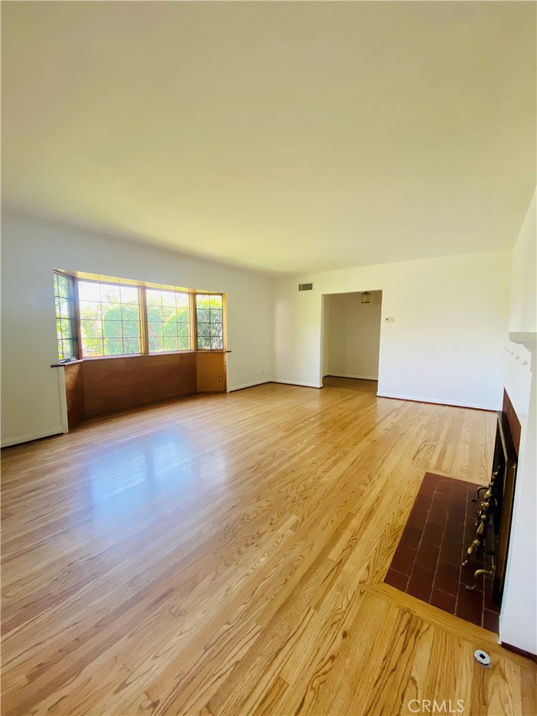 1917 Lyans Drive La Canada Flintridge, CA 91011 - Photo 4 of 25 a view of empty room with wooden floor