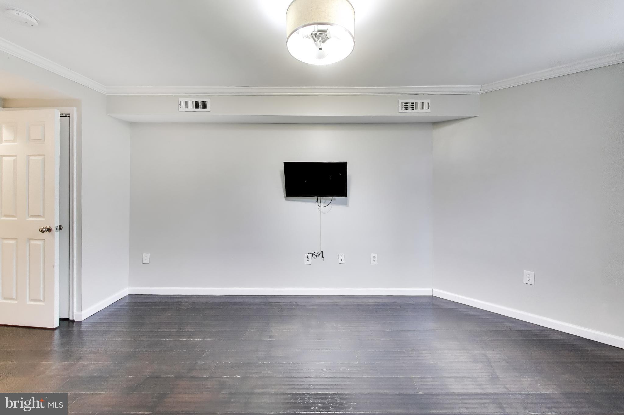 1724 21st Street Northwest, Unit 1 Washington, DC 20009 - Photo 9 of 17 a view of an empty room