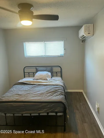 a view of bedroom with a bed