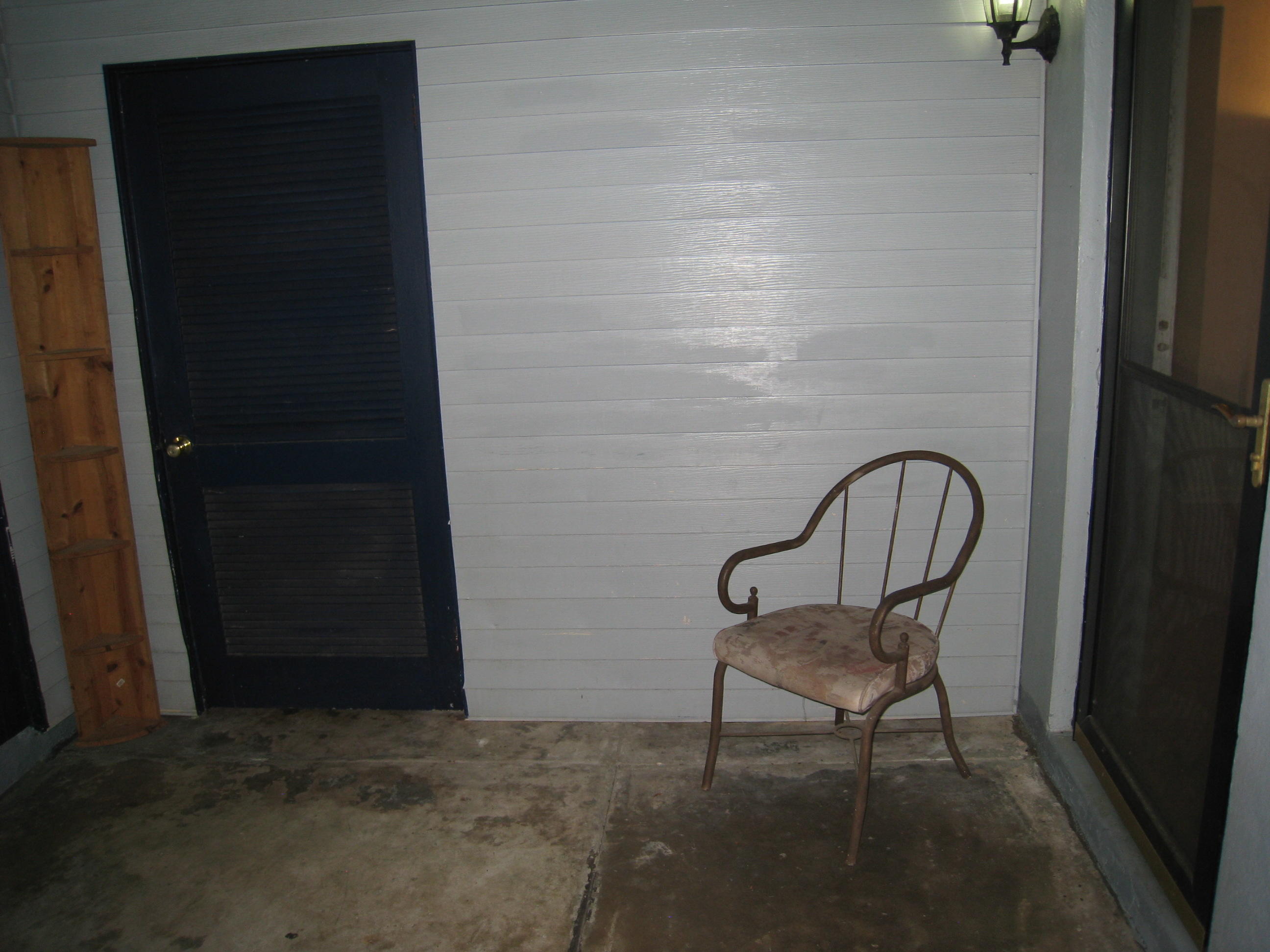 7052 Clovis Road Jacksonville, FL 32205 - Photo 8 of 34 a view of a bench in a door