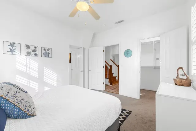 a bedroom with a bed and a cabinets