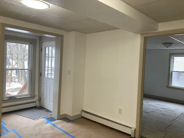 a bathroom with a sink a toilet and bathtub