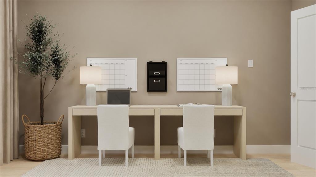 909 Tundra Loop Groveland, FL 34736 - Photo 18 of 25 a kitchen with a table chairs and a potted plant