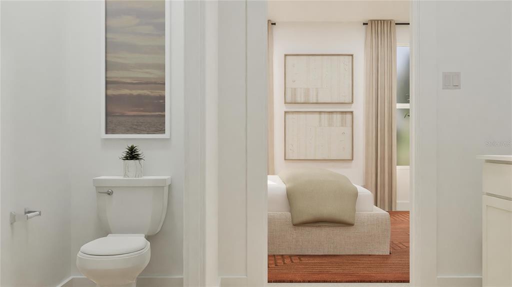 909 Tundra Loop Groveland, FL 34736 - Photo 24 of 25 a bathroom with a toilet and a sink