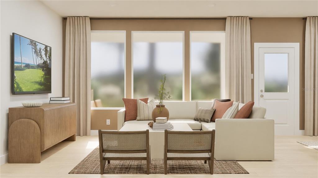 909 Tundra Loop Groveland, FL 34736 - Photo 6 of 25 a living room with furniture and a large window