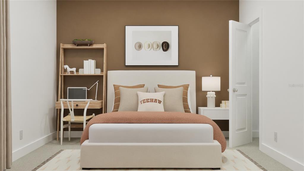 909 Tundra Loop Groveland, FL 34736 - Photo 8 of 25 a bed sitting in a bedroom next to a window