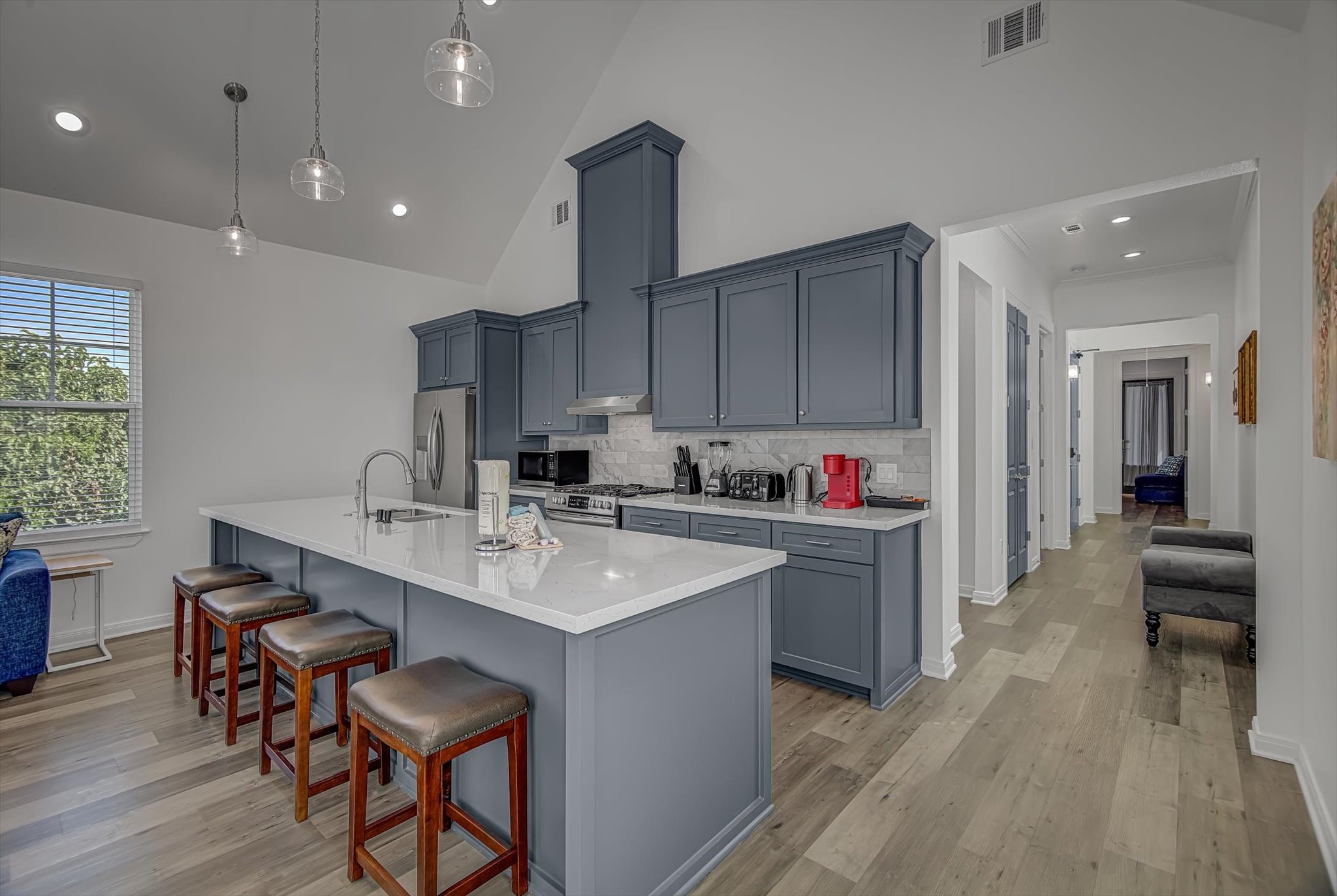 2301 67th Street Galveston, TX 77551 - Photo 13 of 46 a kitchen with a sink and cabinets