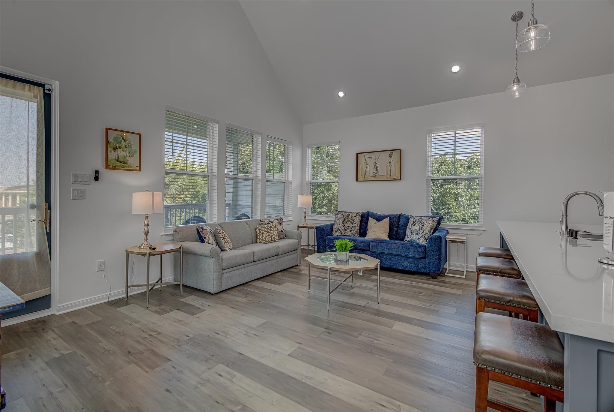 2301 67th Street Galveston, TX 77551 - Photo 16 of 46 a living room with furniture and a wooden floor
