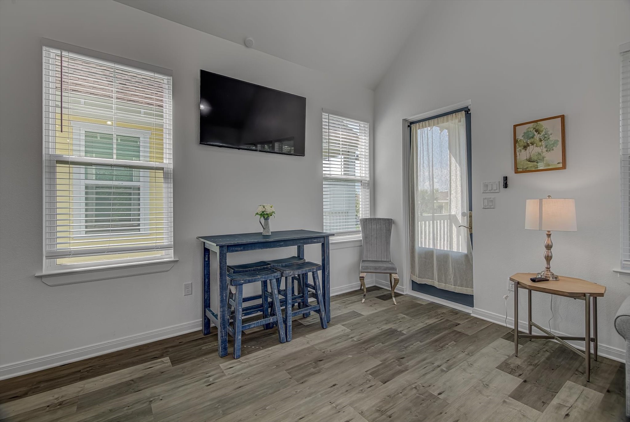 2301 67th Street Galveston, TX 77551 - Photo 20 of 46 a workspace room with furniture window and wooden floor