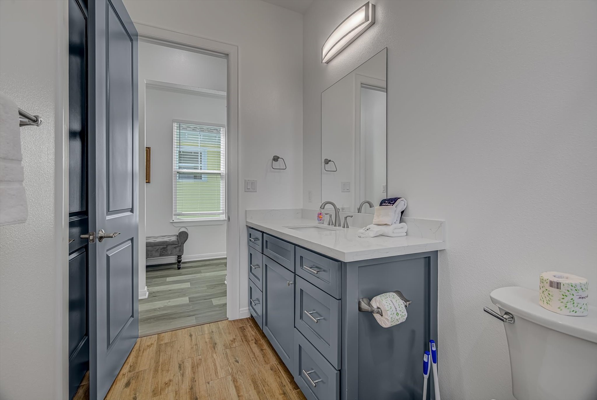 2301 67th Street Galveston, TX 77551 - Photo 23 of 46 a bathroom with a sink mirror and a shower