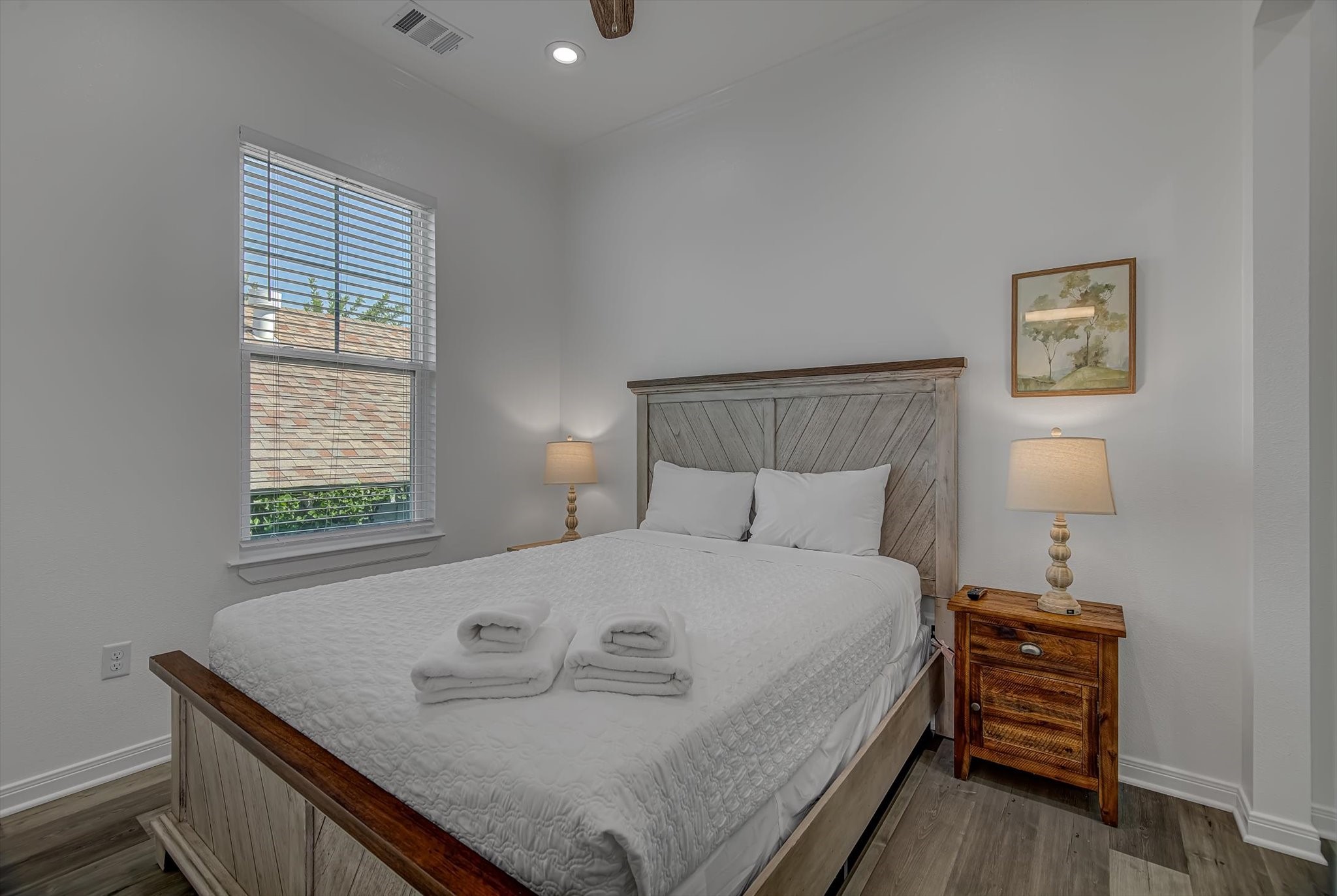 2301 67th Street Galveston, TX 77551 - Photo 25 of 46 a bedroom with a bed and a window