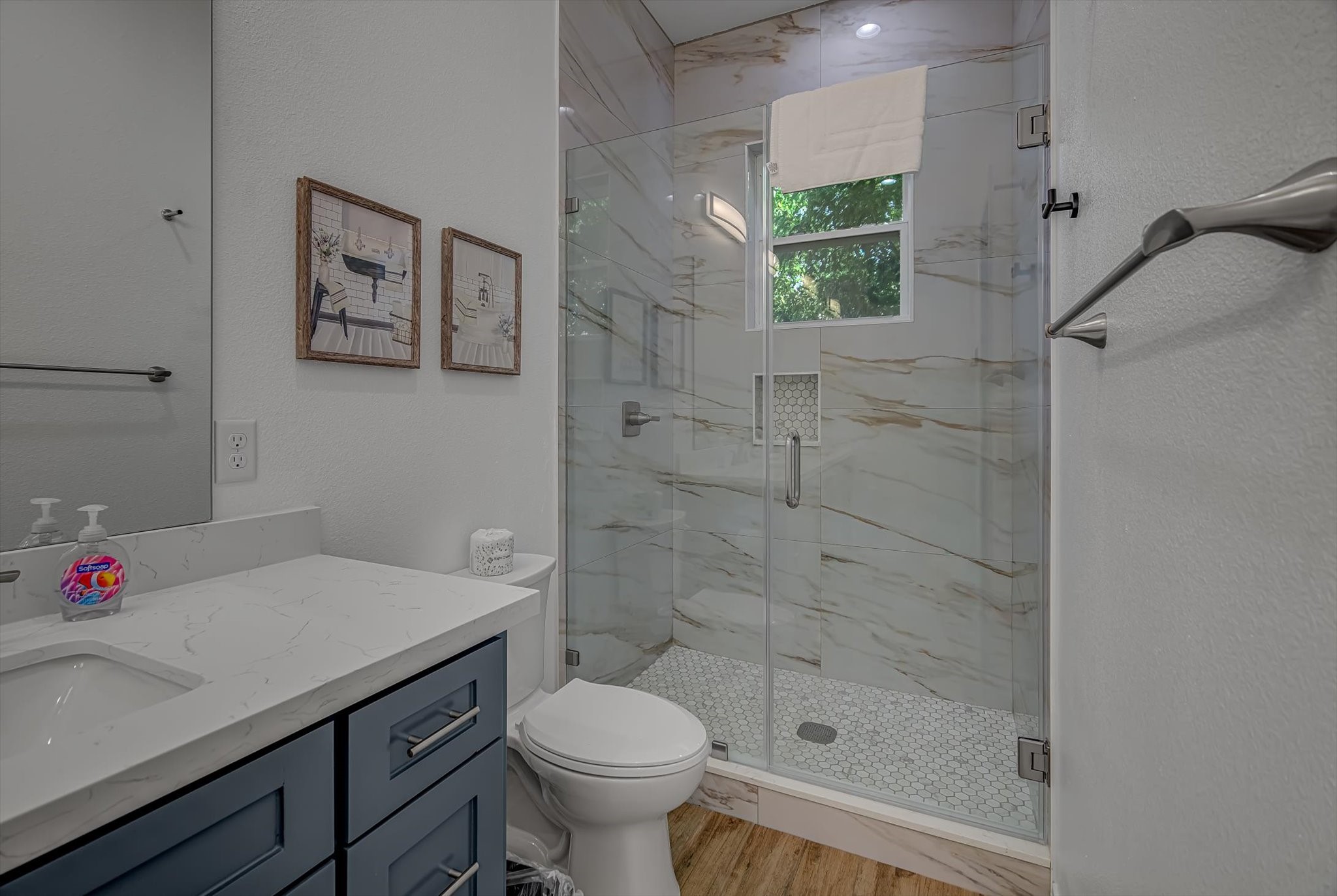 2301 67th Street Galveston, TX 77551 - Photo 32 of 46 a bathroom with a sink toilet and shower