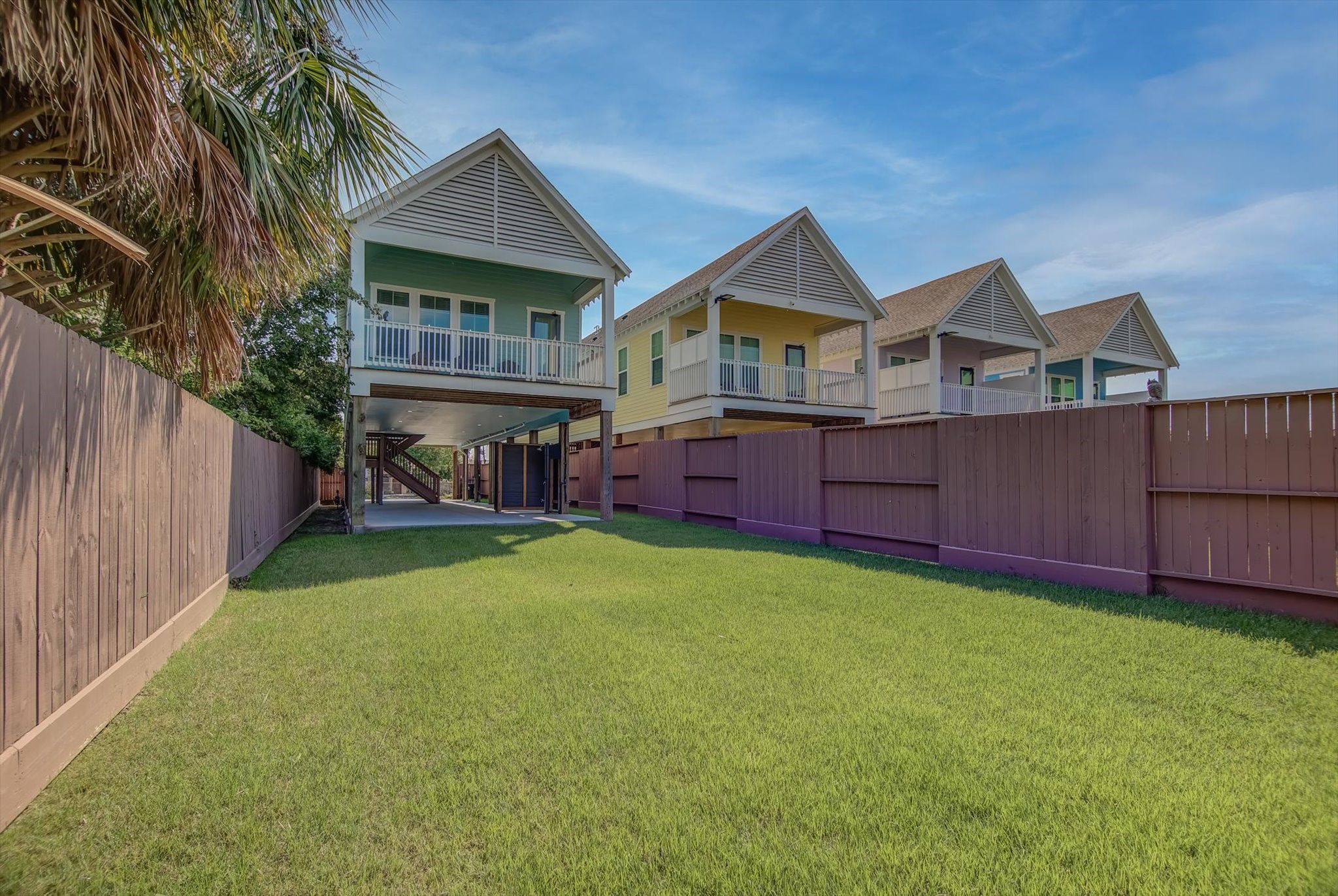 2301 67th Street Galveston, TX 77551 - Photo 40 of 46 a front view of a house with garden